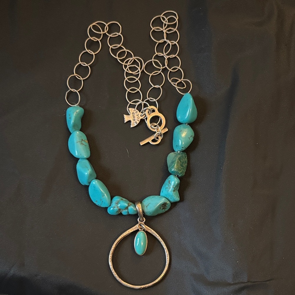 Peyote bird Sterling silver and Turquoise Beaded Necklace with Silver Pendant
